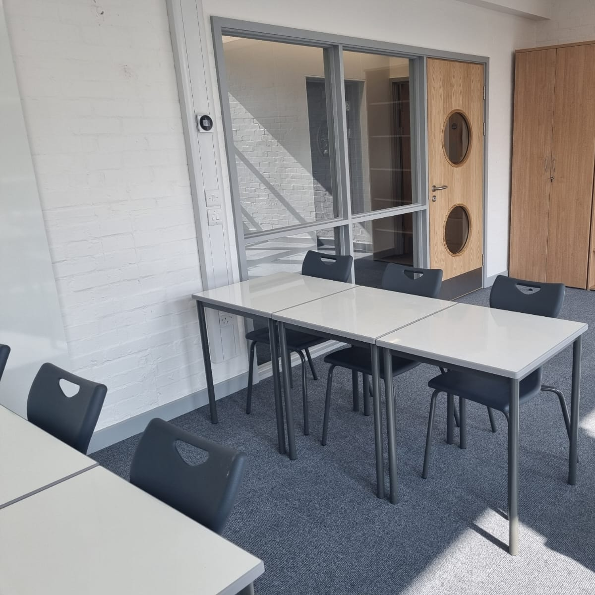 600x600mm dry wipe, whiteboard tables in a classroom