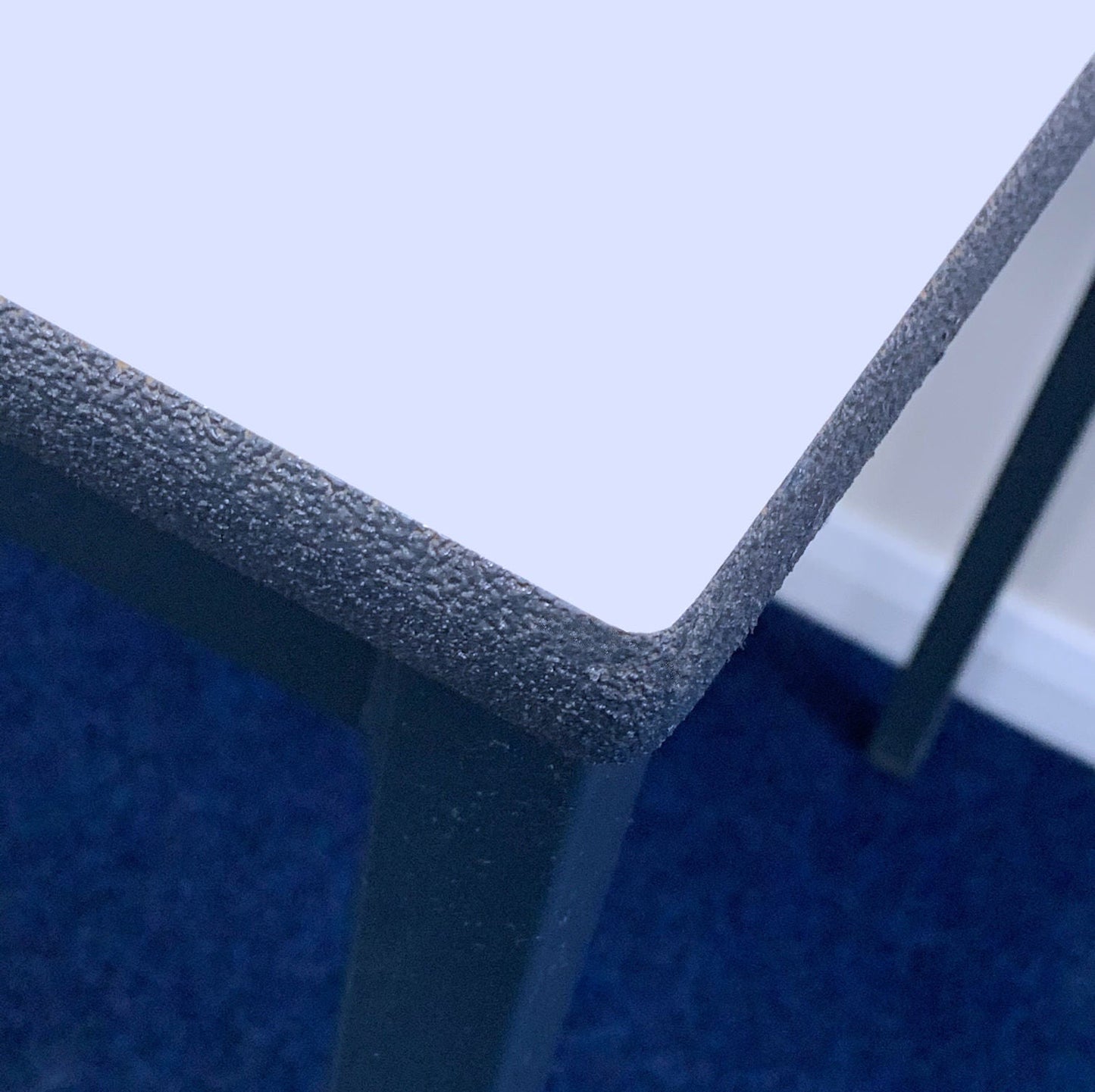 Sprayed PU edged classroom table top, close up